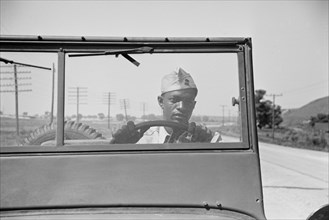 Driver of Jeep of a Reconnaissance Unit, Fort Riley, Kansas, USA, Jack Delano for Office of War Information, April 1942