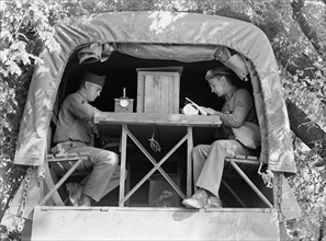 Signal Corps Message Center Set up During a Field Problem, Fort Riley, Kansas, USA, Jack Delano for Office of War Information, April 1942