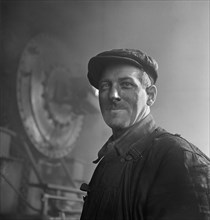 Worker Employed at Roundhouse at Chicago and Northwestern Railroad yard, Chicago, Illinois, USA, Jack Delano for Office of War Information, December 1942