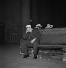 Sailor Asleep in Waiting Room, Union Station, Chicago, Illinois, USA, Jack Delano for Office of War Information, January 1943