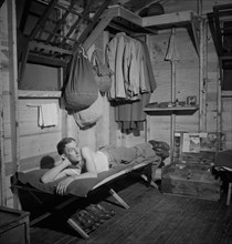 Enlisted Man of the 25th Service Group Relaxing in his Hutment, Air Service Command, Greenville, South Carolina, USA, Jack Delano for Office of War Information, July 1943