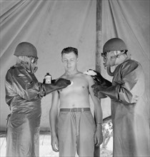 Men of Medical unit of 25th Service Group Simulating Treatment of Gas Casualty, Greenville, South Carolina, USA, Jack Delano for Office of War Information, July 1943
