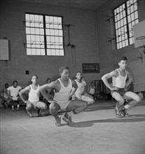 Boys Exercising in Gym Class, Armstrong Technical High School, Washington DC, USA, Marjorie Collins for Farm Security Administration, March 1942