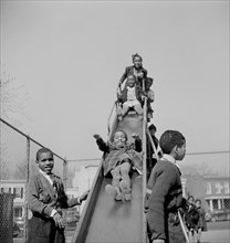 Children on Slide during Recreation at Grammar School, Washington DC, USA, Marjorie Collins for Farm Security Administration, March 1942