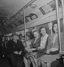 Passengers on Bus at 4pm, Baltimore, Maryland, USA, Marjorie Collins for Office of War Information, April 1943