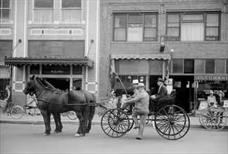 Horse and Buggy on a Main Street, Billings, Montana, USA, Arthur Rothstein for Farm Security Administration (FSA), August 1939