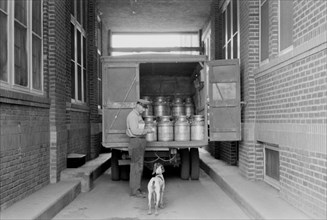 Worker at Milk Receiving Station, Farmington, Minnesota, USA, Arthur Rothstein for Farm Security Administration (FSA), September 1939