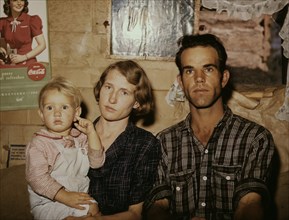Jack Whinery, Homesteader, with his Wife and Youngest of his Five Children, Pie Town, New Mexico, USA, Russell Lee, September 1940