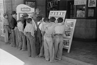 Children in Front of Moving Picture Theater, Alpine, Texas, USA, Russell Lee, May 1939