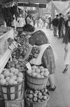 Saleswoman at Grocery Store, Waco, Texas, USA, Russell Lee, November 1939