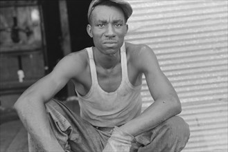Worker at Cotton Gin, Lehi, Arkansas, USA, Russell Lee, September 1938