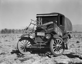 Migrant Worker's Car from Texas Parked in Field, Coachella Valley, California, USA, Dorothea Lange for Farm Security Administration, February 1937