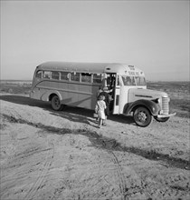Children Getting on School Bus, Dead Ox Flat, Malheur County, Oregon, USA, Dorothea Lange for Farm Security Administration, October 1939