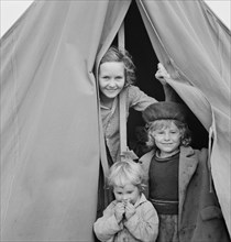 Light-hearted Children in Farm Security Administration (FSA) Camp, Merrill, Klamath County, Oregon, USA, Dorothea Lange for Farm Security Administration, October 1939
