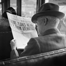 Man Reading War News on Streetcar, San Francisco, California, USA, John Collier for Office of War Information, December 1941