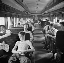 Special Train Bringing Agricultural Workers to Upstate New York, USA to work with the Harvest, John Collier for Farm Security Administration, September 1942