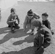 Children Playing Marbles, Trampas, New Mexico, USA, John Collier for Office of War Information, January 1943