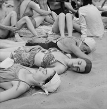 Sun Bathers on Sand Beach at Amusement Park Swimming Pool, Glen Echo, Maryland, USA, Esther Bubley for Office of War Information, July 1943
