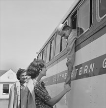 Serviceman Saying Goodbye from Greyhound Bus Window, near Rome, Georgia, USA, Esther Bubley for Office of War Information, September 1943