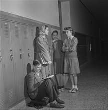 Group of High School Students Talking at Lockers, Washington DC, USA, Esther Bubley for Office of War Information, October 1943