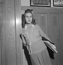 Teenage Girl Wearing Sweater and Long Bead Necklace, Woodrow Wilson High School, Washington DC, USA, Esther Bubley for Office of War Information, October 1943