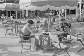 Two Men Playing Cards Poolside, Miami Beach, Florida, USA, Marion Post Wolcott for Farm Security Administration, March 1939