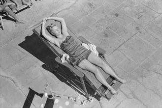 Woman Sunbathing Poolside, High Angle View, Marion Post Wolcott for Farm Security Administration, March 1939