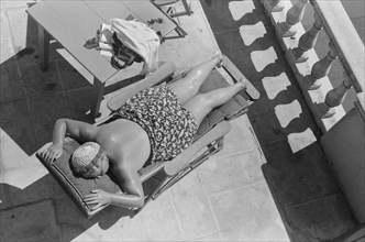Woman Sunbathing Poolside, High Angle View, Marion Post Wolcott for Farm Security Administration, March 1939