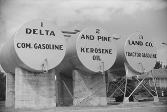 Gas and Oil Tanks, Delta and Pine Land Company, Scott, Mississippi, USA, Marion Post Wolcott for Farm Security Administration, October 1939