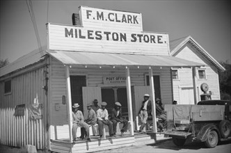 Tenant Farmers on Porch of Store and Post Office, Mileston, Mississippi, USA, Marion Post Wolcott for Farm Security Administration, October 1939