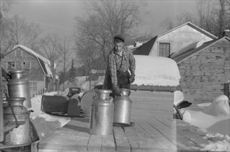 Farmer Bringing Cans of Milk to Crossroads Early in Morning where they are Picked up by Coop Farmers Truck and Delivered to City, near Woodstock, Vermont, USA, Marion Post Wolcott for Farm Security Ad...