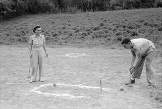 Two People Playing Croquet at American Legion Fish Fry, Oldham County, near Louisville, Kentucky, USA, Marion Post Wolcott for Farm Security Administration, August 1940