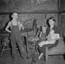 Coal Miner's Wife and Three of their Children at Home, Pursglove, West Virginia, USA, Marion Post Wolcott for Farm Security Administration, September 1938