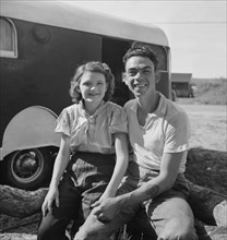 Portrait of Young Couple, Migrant Laborers at Packinghouse, Canal Point, Florida, USA, Marion Post Wolcott for Farm Security Administration, February 1939