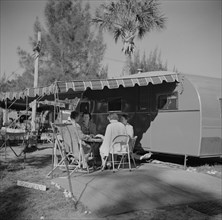 Women Playing Cards on Porch of Trailer Home, Sarasota, Florida, USA, Marion Post Wolcott for Farm Security Administration, January 1941