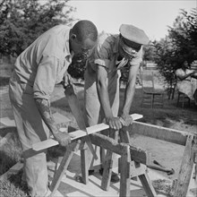 Two Men Sawing Wood, Ridge, Maryland, USA, Marion Post Wolcott for Farm Security Administration, July 1941