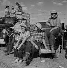 Group of People from Local Ranch watching Crow Fair, Crow Agency, Montana, USA, Marion Post Wolcott for Farm Security Administration, July 1941Marion Post Wolcott for Farm Security Administration,