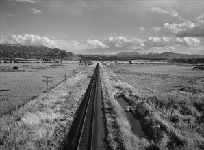 Railroad Tracks with Sawatch Mountains in Background, near Buena Vista, Colorado, Marion Post Wolcott for Farm Security Administration, September 1941