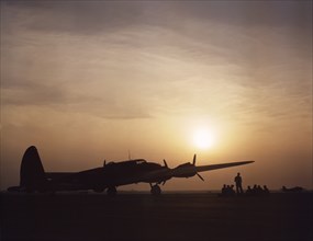 Silhouette of B-17 Bomber "Flying Fortress" at Sunset, Langley Field, Virginia, USA, Alfred T. Palmer for Office of War Information, July 1942