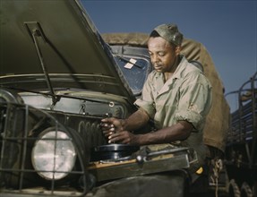 Mechanic, Motor Maintenance Section, Fort Knox, Kentucky, USA, Alfred T. Palmer for Office of War Information, June 1942