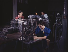 Workers Numbering Sheet Metal Parts with Pneumatic Number Machine, North American Aviation, Inglewood, California, USA, Alfred T. Palmer for Office of War Information, October 1942
