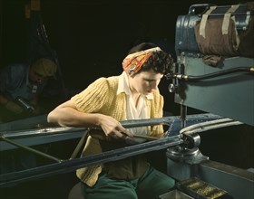 Female Riveting Machine Operator of B-17F Bomber, Douglas Aircraft Company, Long Beach, California, USA, Alfred T. Palmer for Office of War Information, October 1942