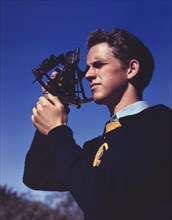 Thomas Graham, Member of Victory Corps at Polytechnic High School, Learning to use Sextant to Determine Longitude and Latitude, Los Angeles, California, USA, Alfred T. Palmer for Office of War Informa...