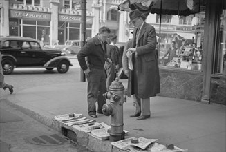 Newspaper Vendor on Street Corner, Manchester, New Hampshire, USA, Carl Mydans for U.S. Resettlement Administration, September 1936