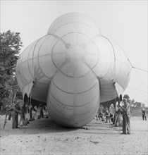 Close-Up View of Special U.S. Marine Units in Training Bedding Down Big Barrage Balloon, Parris Island, South Carolina, USA, Alfred T. Palmer for Office of War Information, May 1942