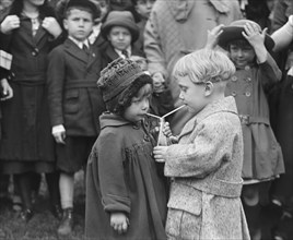 Two Children Sharing Drink, Washington DC, USA, National Photo Company, March 1922