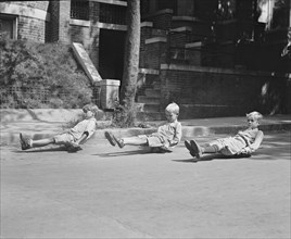 Three Boys on Scooter Skates, National Photo Company, September 1922