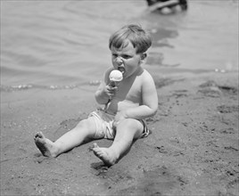 Young Boy Eating Ice Cream on Beach, Washington DC, USA, National Photo Company, June 1924