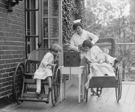 Two Young Girls Listening to Radio at Children's Hospital, Washington DC, USA, National Photo Company, August 1924