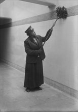 Subway Porter with Duster at Subway Station, New York City, New York, USA, Bain News Service, December 1917